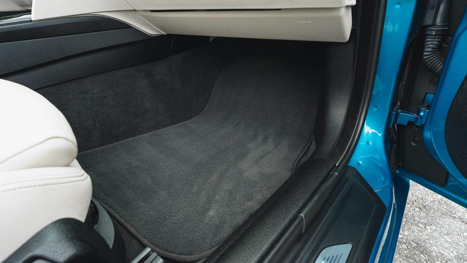 The Most Important Photos in a Car Auction Listing Might Be the Floor Mats